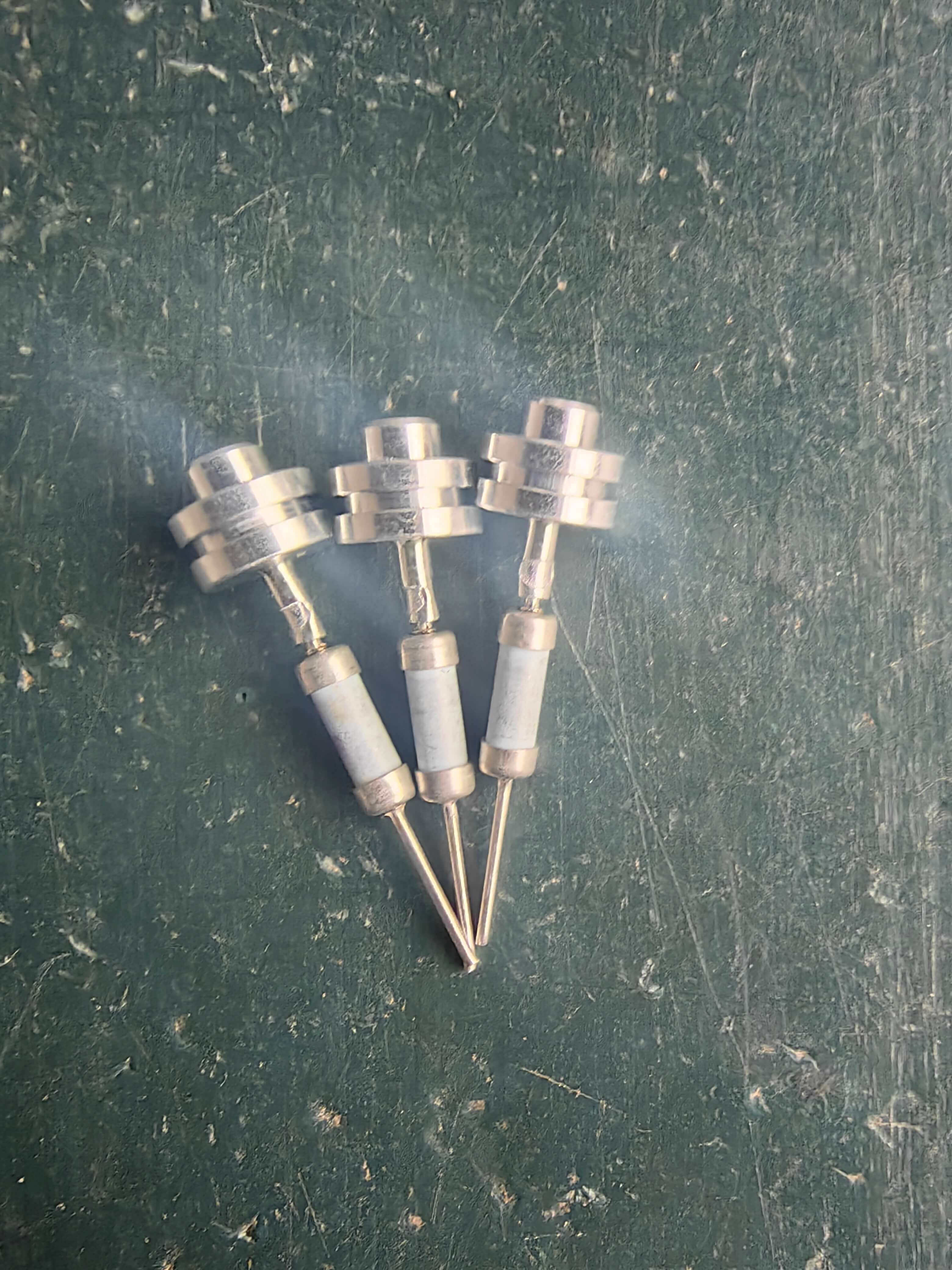 Custom conductive terminal material selection